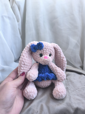 Little bunny in a blue dress