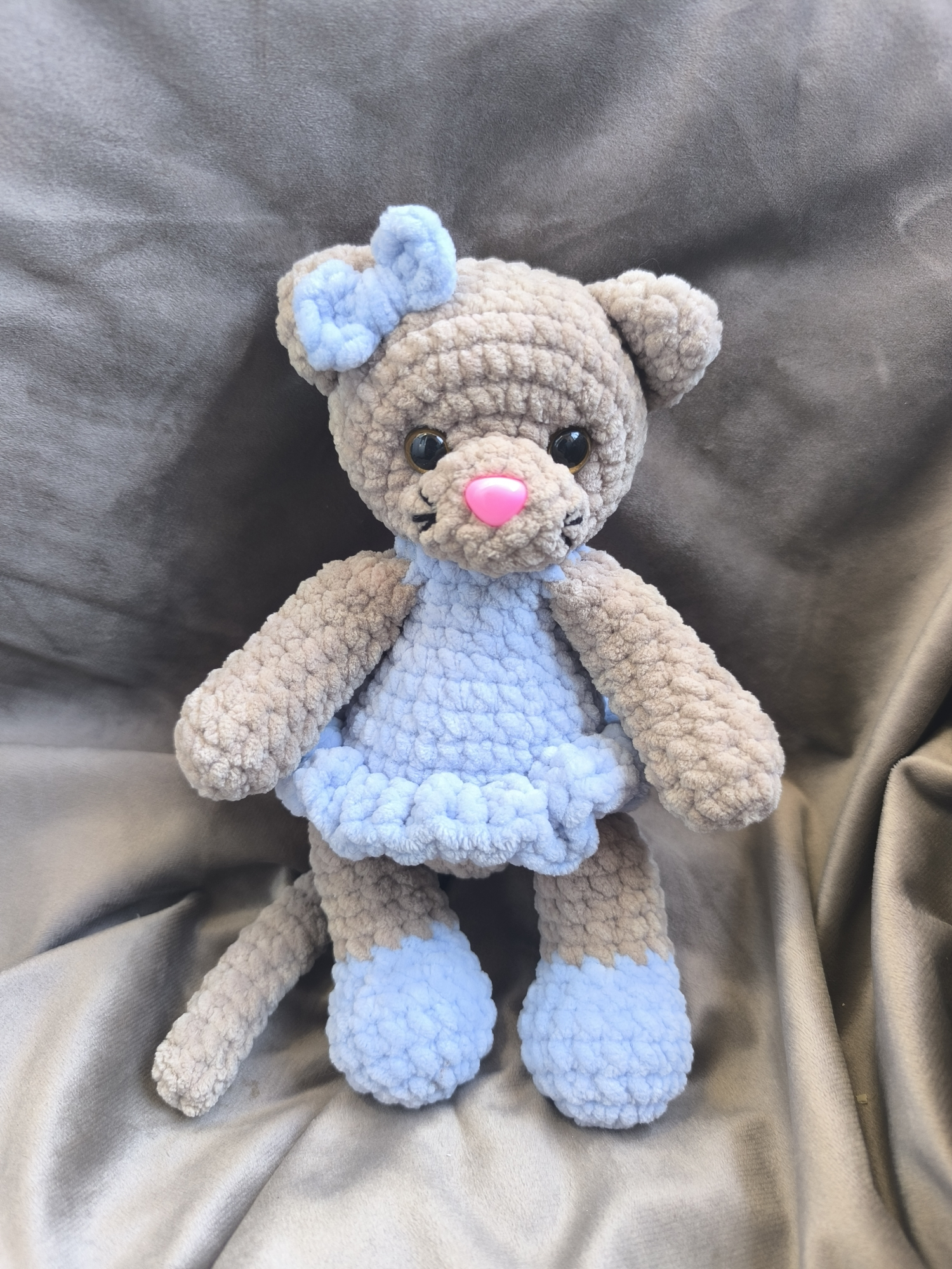 Kitten in a blue dress